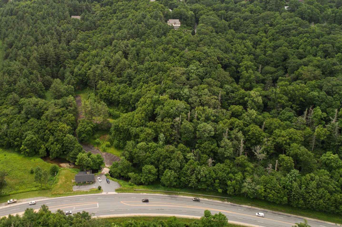 Aerial view closeup of Headwaters property to become treetop cabins